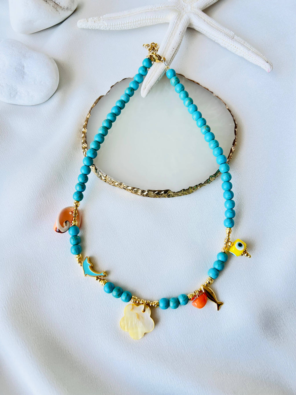 Kralenketting met gele bloem