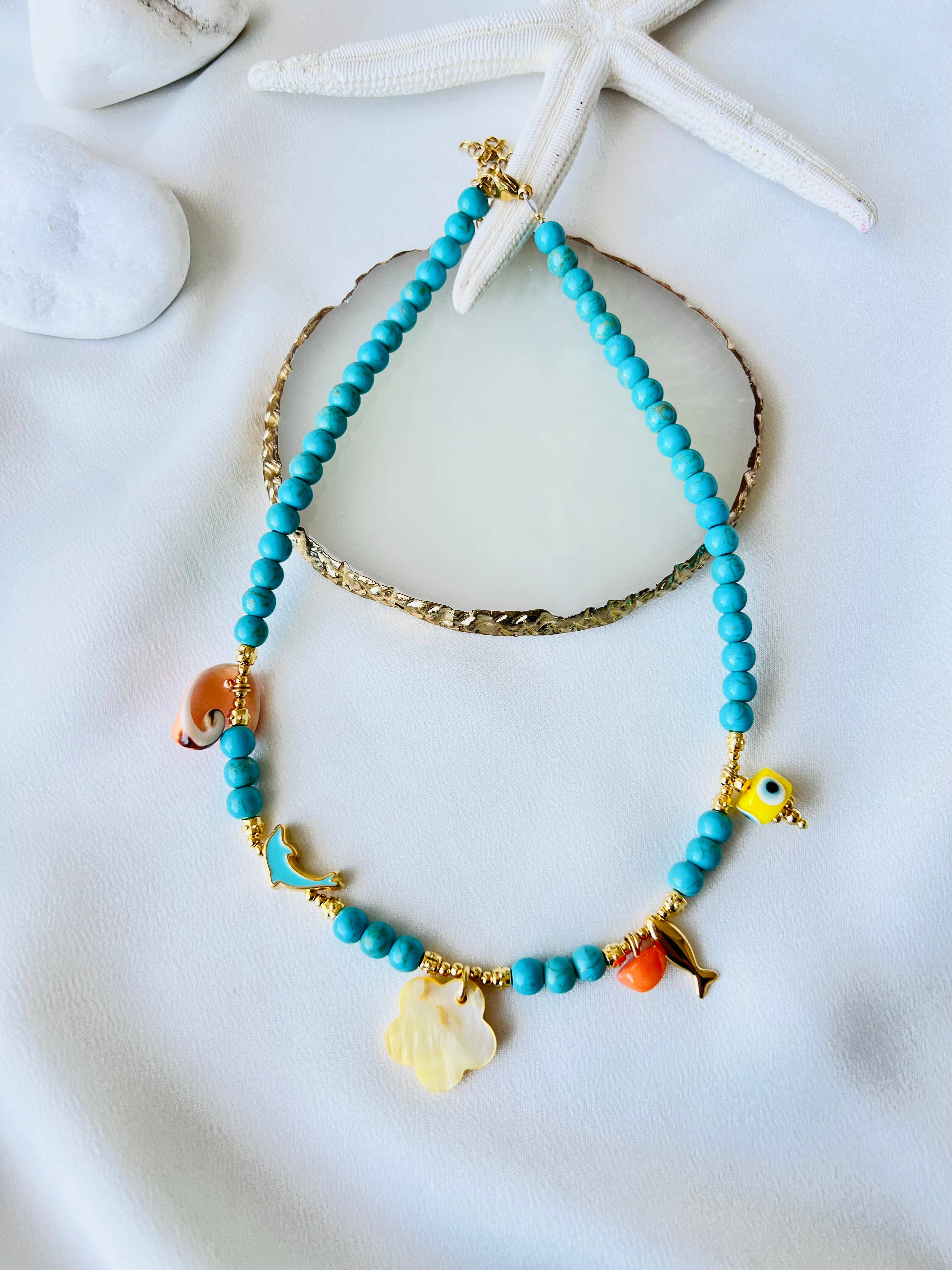 Kralenketting met gele bloem