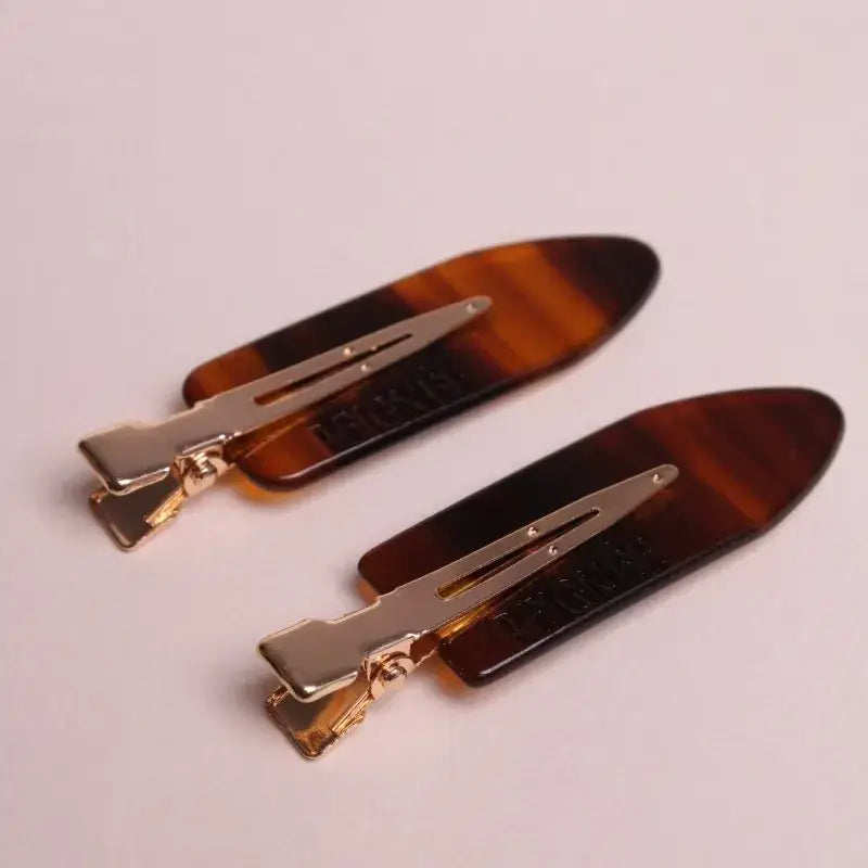 Ebène haarclipset (paar)