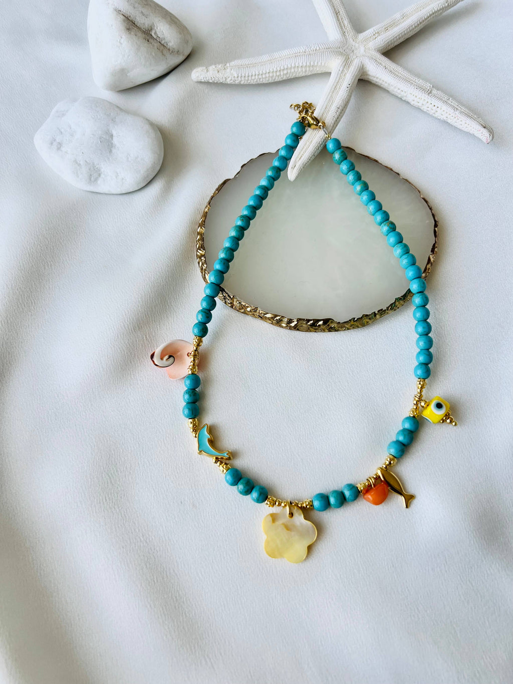 Kralenketting met gele bloem